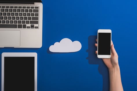 cropped-view-of-woman-holding-smartphone-near-empt-2023-11-27-05-11-24-utc